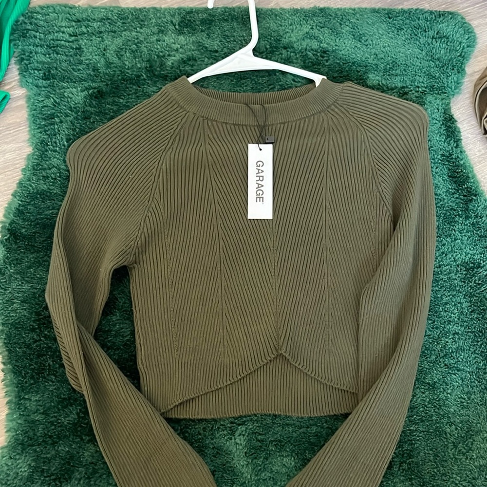 Brand new olive green top from Garage. Size small